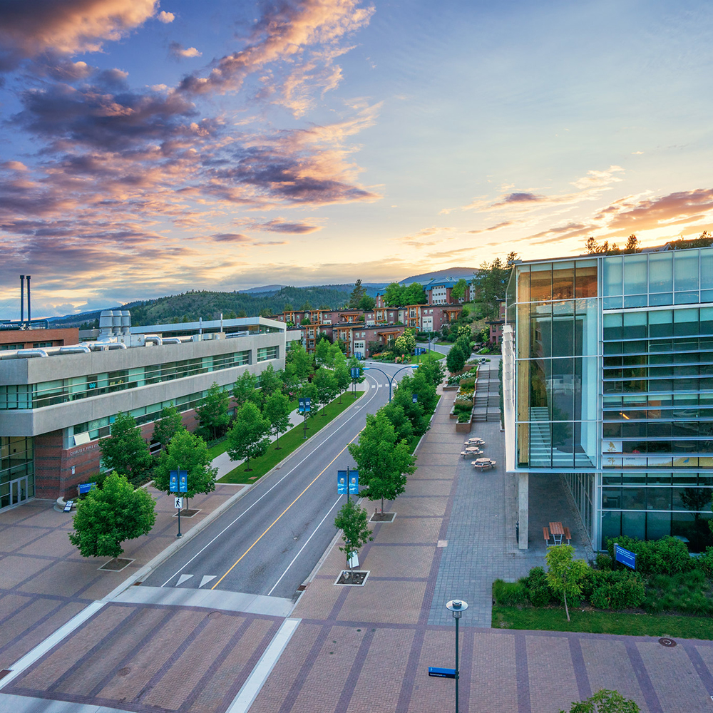 Aerial view of UNC and Fipke buildings on campus at sunrise