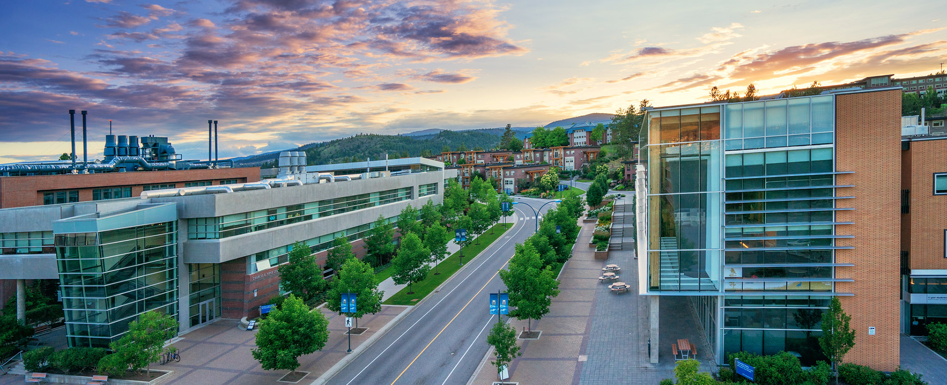 Aerial view of UNC and Fipke buildings on campus at sunrise